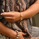 Pozłacana bransoletka z głowami panter z cyrkoniami.  PROSTO W OCZY