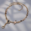 Złocony naszyjnik z dekorami z perłami i kryształkami. JESTEM ZDECYDOWANA