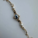 Złocona bransoletka z czterema perłami i kryształami. PARYSKA CUKIERNIA