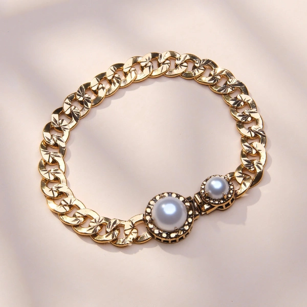 Zlocona bransoletka na pancerce z dwiema perlami. GLORIA