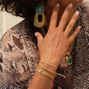 Złoty naszyjnik z zawieszką z turkusowym kamieniem. CASTEL DELL OVO