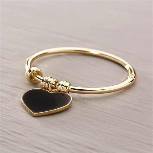 AMOR VERDADERA. Una pulsera rígida con un corazón negro.