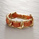 Złota bransoletka łańcuch z pomarańczowym paskiem. OPALONA SKÓRA