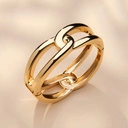 Sztywna bransoletka ze złoconych grubych ogniw. SPLOT ŚWIATŁA