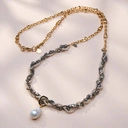 Długi pozłacany naszyjnik z hematytami i barokową perłą. COSTA BRAVA