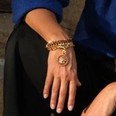 Pozłacana bransoletka łańcuch z ozdobnym medalionem. MACAW