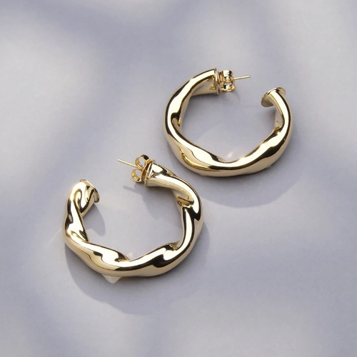 Pozłacane kolczyki koła a la skręcona lina. SPIRALA BLASKU