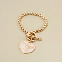 Bransoletka łańcuch z sercem z motywem gołębicy. SERCE NA DŁONI