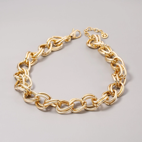 Złocony naszyjnik z podwójnych ogniw o nieregularnej formie. DONNA FORTE