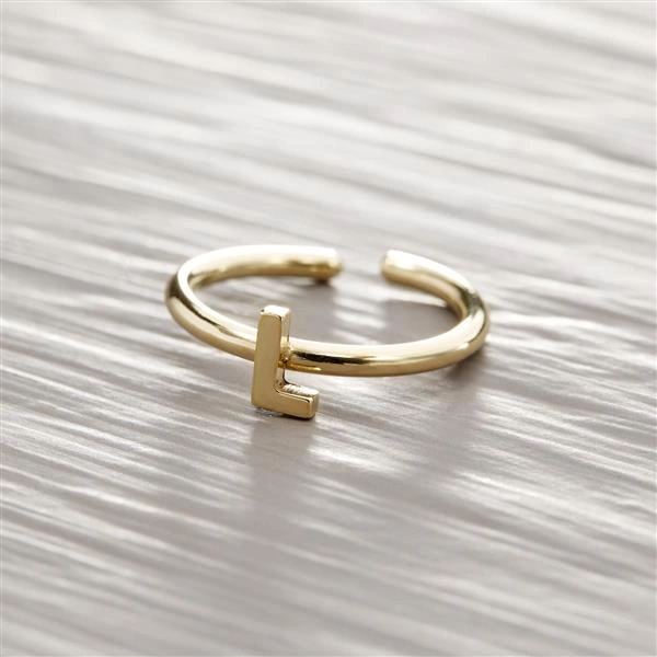 Złoty regulowany pierścionek z ozdobną literką L. L - LUCYNA