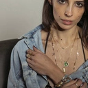 Pozłacany naszyjnik na łańcuszku z małymi krzyżami. PUNKOWY