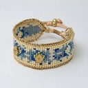 Wąska bransoletka tkana z paciorków Miyuki z dekorami. LATO W MENTON