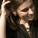 SANTO VERSACE. Colgante con un león negro