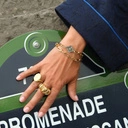 Złocona bransoletka na łańcuchu ze srebrzonym kwiatem. OGRODY SCHONBRUNN