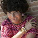 Złota bransoletka łańcuch z medalionem z głową lwa. GIANNI VERSACE