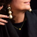 Pozłacany naszyjnik z ażurowym kulistym dekorem. ODDECH RIWIERY