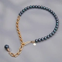 Krótki pozłacany naszyjnik z pereł w kolorze petrol. HISZPAŃSKIE TAŃCE