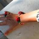 Złocona bransoletka z kolorowymi głowami papug. PLOTECZKI