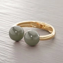 Sztywna złota bransoletka z dwiema kulami khaki. KHAKI NA CIEPŁO