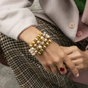 Regulowany pierścionek z dużym bordowym oczkiem. WIOSNĄ SOCZYŚCIE