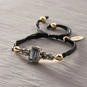 Bransoletka na czarnym sznurku z szarymi kryształami. FRANCUSKI STYL