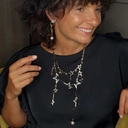 Złocone kolczyki z perłami i czarnymi kryształkami. MADEMOISELLE