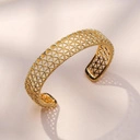 Wąska złocona bransoletka z ażurowym wzorem. PRZEŚWITY SŁOŃCA