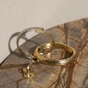 Sztywna otwarta bransoletka w kolorach srebra i złota. DWA W JEDNEJ