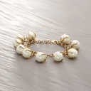 YOU CAN GO YOUR OWN WAY. Pulsera con colgantes