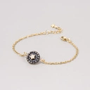 Pozłacana bransoletka z dekorem z gwiazdą z cyrkonii. UNA STELLA