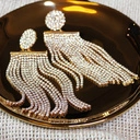 Długie, wiszące kolczyki z kilku sznurów cyrkonii. BLASK I LUKSUS