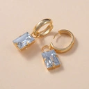 Pozłacane kolczyki koła z prostokątnymi kryształami. ŚWIATŁA SAO PAULO