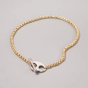 Złocony naszyjnik na łańcuszku z zapięciem a la toggle. BLISKI KONTAKT