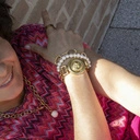 Złota bransoletka łańcuch z medalionem z głową lwa. GIANNI VERSACE