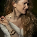 Sztywna pozłacana bransoletka à la skręcona lina. PRZYWIĄZANIE