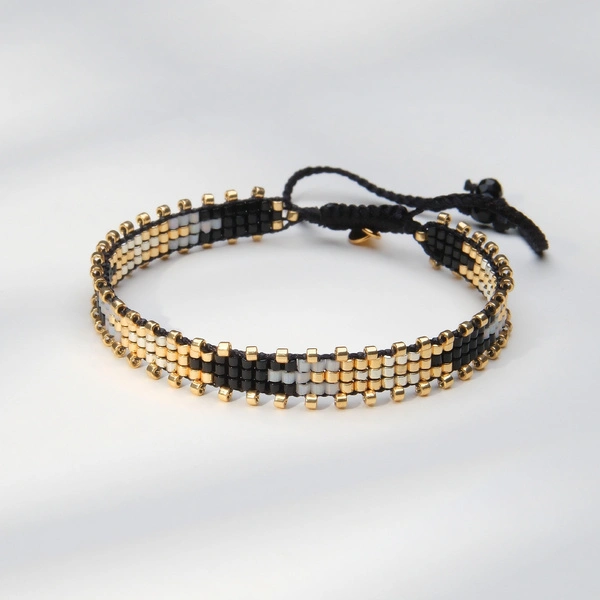 Wąska bransoletka ręcznie tkana z paciorków Miyuki. DNI DŁUŻSZE OD NOCY