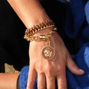 Pozłacana bransoletka z brązowym kordonkiem. TROPIK