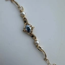 Złocona bransoletka z czterema perłami i kryształami. PARYSKA CUKIERNIA