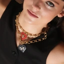 Pozłacany wisior z czarnym sercem z motylkiem z cyrkonii. NIE DLA WSZYSTKICH