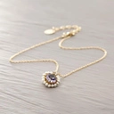 Wiktoriański wisiorek z lawendowym kryształkiem . ZAKOCHANA