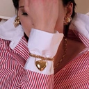 Złocona bransoletka na pancerce z pełnym sercem. TAK MI PASUJE