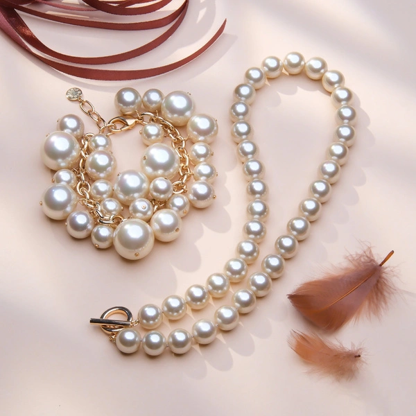 Zestaw naszyjnik i bransoletka z pereł w kolorze szampana. MODA NAD WSZYSTKO