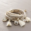 Bransoletka z plecionki z chwostami i kryształami. JASNA SPRAWA