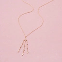 Pozłacany wisiorek z zawieszką trójzębem z cyrkoniami. CODZIENNE RYTUAŁY