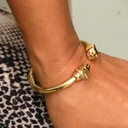 Pozłacana bransoletka z głowami panter z cyrkoniami.  PROSTO W OCZY