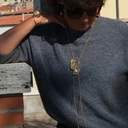 Pozłacana bransoletka z ażurowym dekorem z perłą. UTKANE MARZENIA