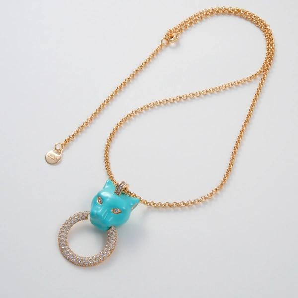 Pozłacany wisiorek z głową dużej pantery z ringiem. INSTYNKT ŁOWCZYNI