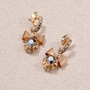 Pozłacane kolczyki kokardki z szarymi kryształkami. BAL DEBIUTANTEK 