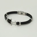 Męska bransoletka ze skóry ze stalowymi elementami. NIEPOKONANY