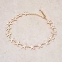 Krótki pozłacany naszyjnik z emaliowanymi rozgwiazdami. PODWODNE NIEBO